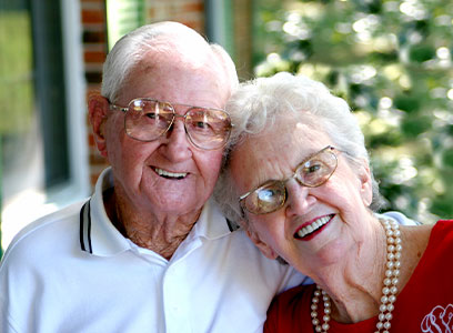 Photo of a couple smiling. Link to Life Stage Gift Planner Over Age 70 Situations.