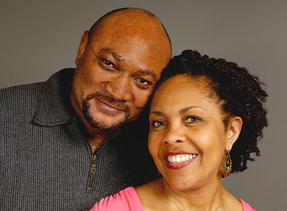 Photo of a couple smiling. Link to Life Stage Gift Planner Under Age 60 Situations.